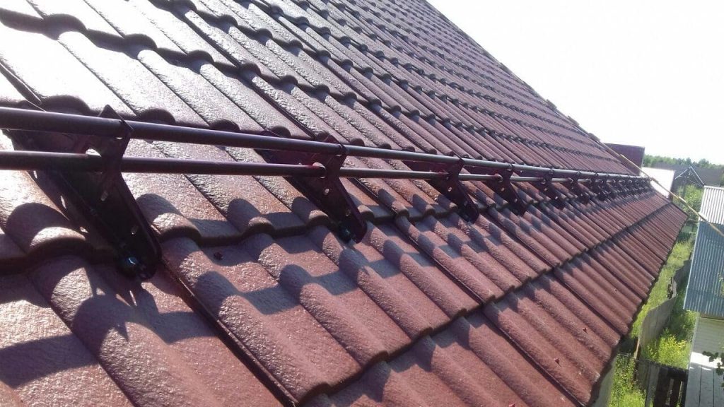 монтаж снегодержателей